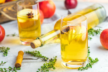 Hard apple cider cocktail with fall fresh thyme and star anise