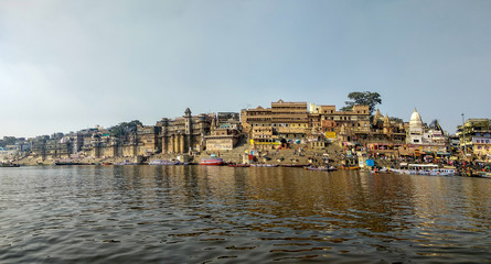 Fototapeta na wymiar River Ganges, Varanasi, Uttar Pradesh, India; 30-Jan-2019; Siberian migratory birds over river Ganges in Varanasi, Uttar Pradesh, India