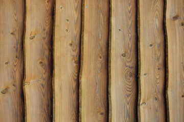 A close up photograph of wood paneling. Background texture