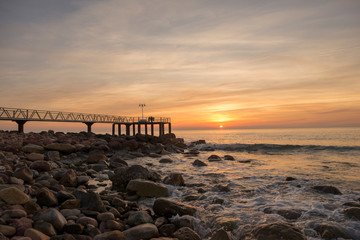 Walkway to the lookout on chilches beach at sunrise