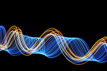 Long exposure, light painting photography.  Electric blue and vibrant metallic gold colour, waves...