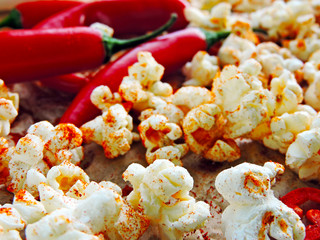 Spicy hot popcorn with chili pepper. Vegan snack