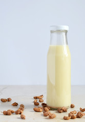 Chufa milk in bottle, with tigernut. Alternative type of milks. Vegan non-dairy milk. Lactose-Free Milk and Nondairy Beverages. Lactose intolerance. Healthy food. Superfood.