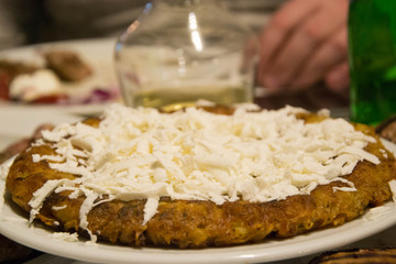 Traditional Bulgarian dish - patatnik, with potato and white cheese, characteristic of the Rhodope Mountain, Bulgaria