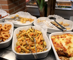 self service restaurant with many raw and cooked foods