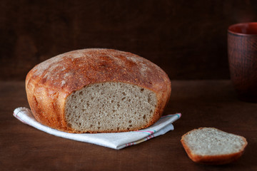 Freshly baked homemade bread is on the table