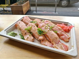 Aburi slightly grilled fatty salmon belly nigiri sushi