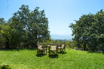 beach chairs and meadow