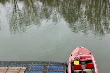 red boat on the lake