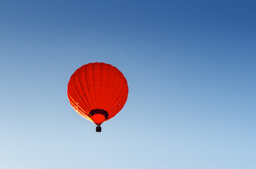Colorful hot air balloon against the blue sky