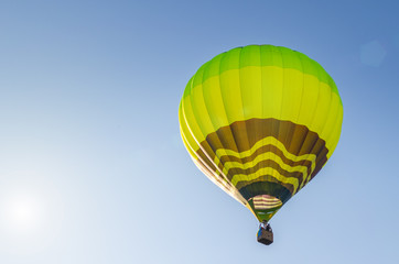 Colorful hot air balloon against the blue sky