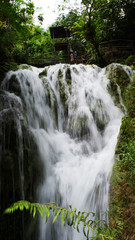 beautiful waterfalls flowing from springs in the forest