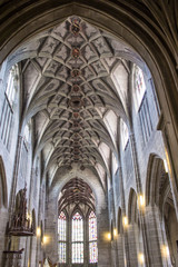 Obraz premium Central nave of the Berne Cathedral. Interior of the Berne Cathedral. Gothic cathedral in Bern