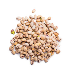 Heap of pistachio nuts isolated over white background, top view