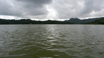 the view of the reddish blue sky at the lake at sunset