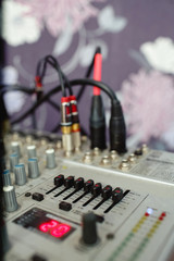 Close-up, volume control of vintage audio mixing deck