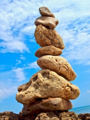 Fototapeta na wymiar Pebbles pf stones at the beach, symbol for inner life balance in Zen meditation
