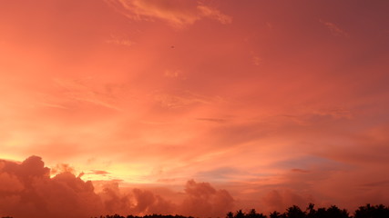 the view of the sky is reddish blue at sunset