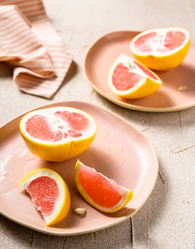 Pink grapefruit on a plate
