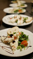 Fresh salad, valerian, tomato, cheese, caviar