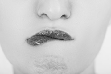 biting female lips