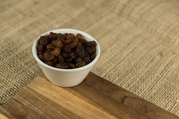 Fototapeta na wymiar raisins in cup
