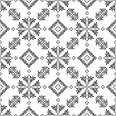 Cross stitch, seamless decorative pattern. Embroidery and knitting. Abstract geometric background. Ethnic ornaments.
