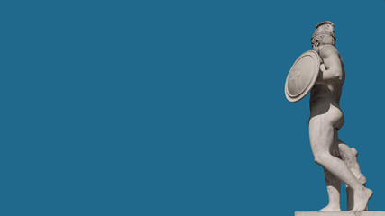 Statue of a naked gladiator at Square of Cascades in Barcelona, Spain, blue sky