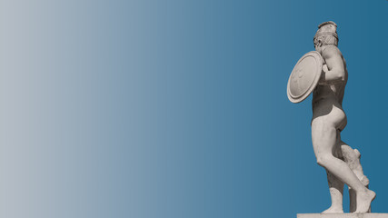 Statue of a naked gladiator at Square of Cascades in Barcelona, Spain, blue sky