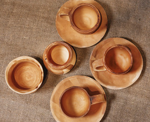 set of cups and clay vessels in a beautiful composition and colors, shot from above