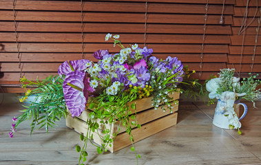 Plastic flowers in wooden box decoration element of interior