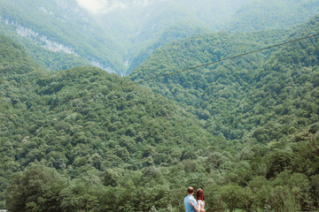 Fototapeta na wymiar couple on top of mountain