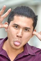 Obraz premium Adult Male Making Funny Faces