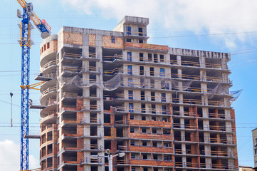 Construction and finishing of a brick house.
