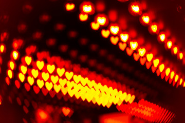 Colorful bokeh lights in heart shape.