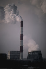 thick smoke comes from the pipe of a thermal power station