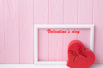 Valentine's Day. Background for Valentine's Day. Pink board. Box for presents. 