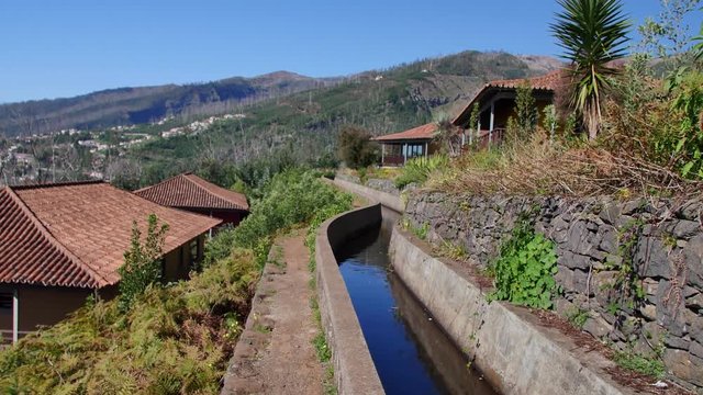 Levada  dos Tornos, Madeira. Beautiful footpath in spring sunlight.