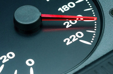 Close up shot of a speedometer in a car, 200 km/h