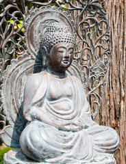 Obraz premium Bronze Japanese style statue of sitting Buddha