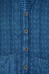 Blue knitted wool texture can use as background. Men's blue Blazer