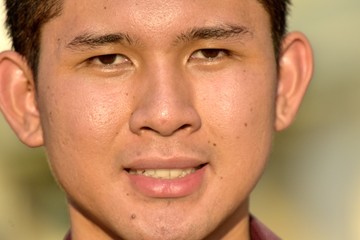 A Smiling Asian Male