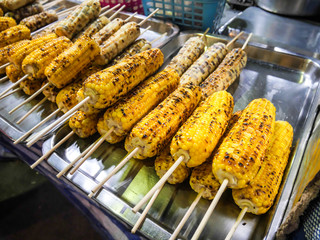 Delicious grilled corn, Grilled corns on the grille over fire at night market