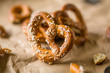Salty Sourdough Pretzels on Brown Background
