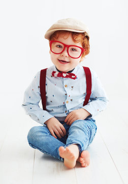 portrait of beautiful redhead toddler baby boy