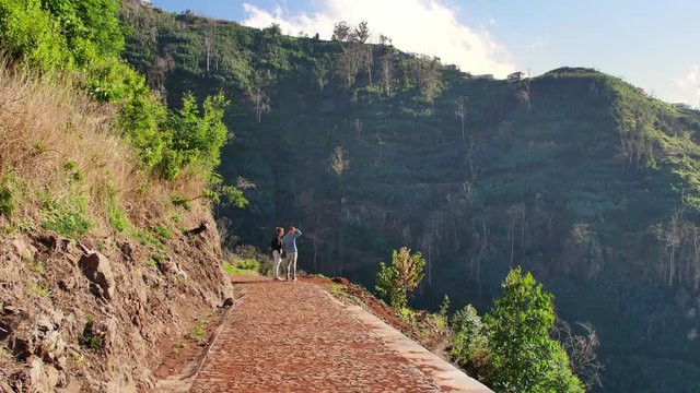 Levada  dos Tornos, Madeira. Beautiful footpath in spring sunlight.