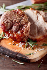 Oven-baked pork with rosemary and spices.