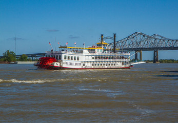 Creole Queen steamboat on Mississippi River in New Orleans, Louisiana. - obrazy, fototapety, plakaty