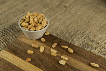 peanuts in a wooden bowl