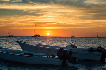Sunset with boats at Los Roques Archipelago in Beautiful Venezuela